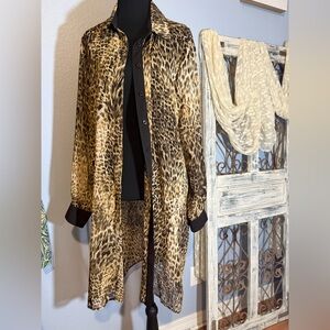 Peter Nygard Leopard Print Sheer Top with Black Accents and Split Back Design